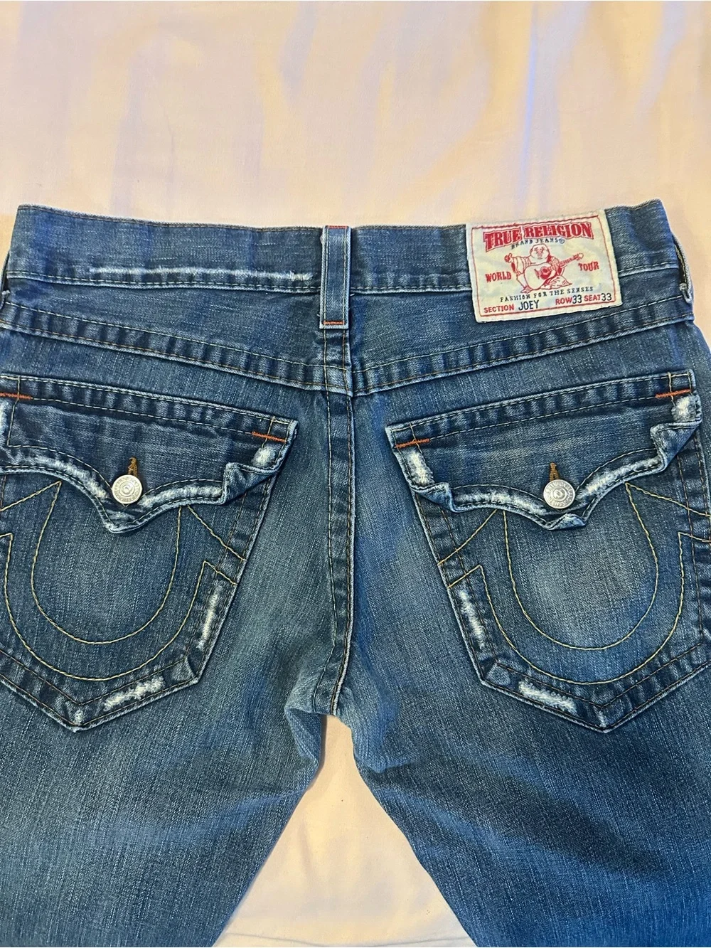 True Religion Men's Joey Jeans in Distressed Blue with Yellow Stitching
